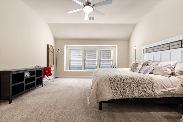 bedroom with visible vents, a ceiling fan, baseboards, carpet flooring, and lofted ceiling