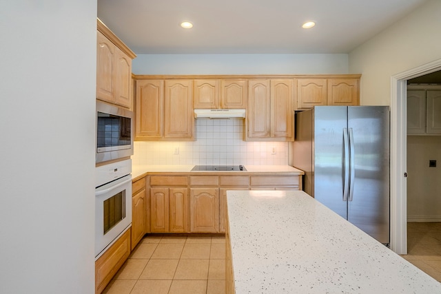 975 W Corporate Dr, Lewisville, TX 75067 - kitchen featuring light countertops, stainless steel appliances, light brown cabinetry, and under cabinet range hood