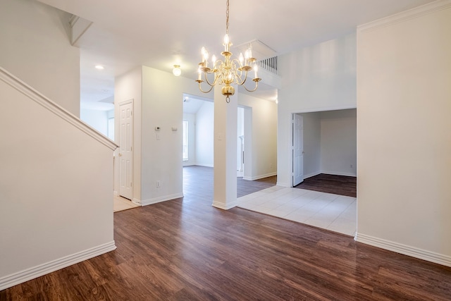 975 W Corporate Dr, Lewisville, TX 75067 - unfurnished dining area featuring an inviting chandelier, visible vents, baseboards, and wood finished floors