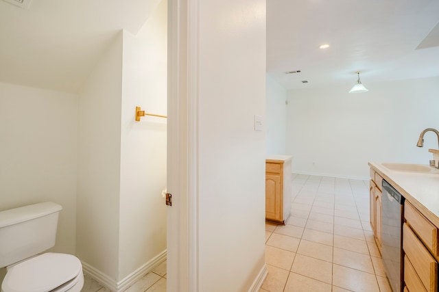 975 W Corporate Dr, Lewisville, TX 75067 - bathroom featuring visible vents, baseboards, toilet, tile patterned floors, and vanity
