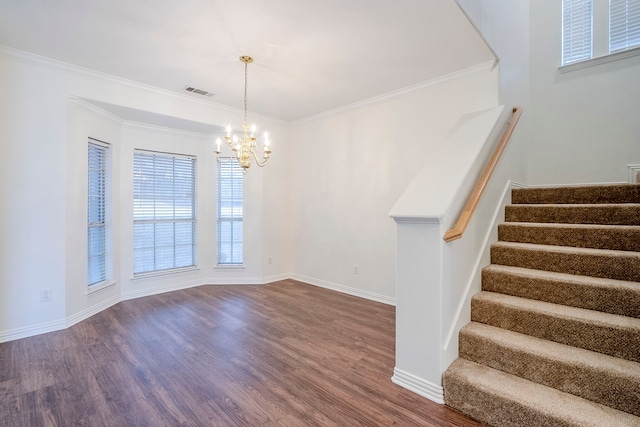 interior space featuring visible vents, dark wood-style flooring, stairs, and crown molding