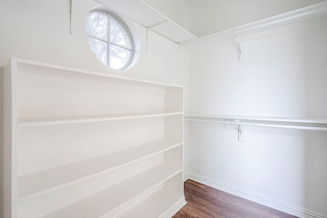 975 W Corporate Dr, Lewisville, TX 75067 - walk in closet featuring wood finished floors