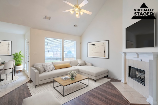975 W Corporate Dr, Lewisville, TX 75067 - living area with visible vents, high vaulted ceiling, light wood-style floors, and a ceiling fan