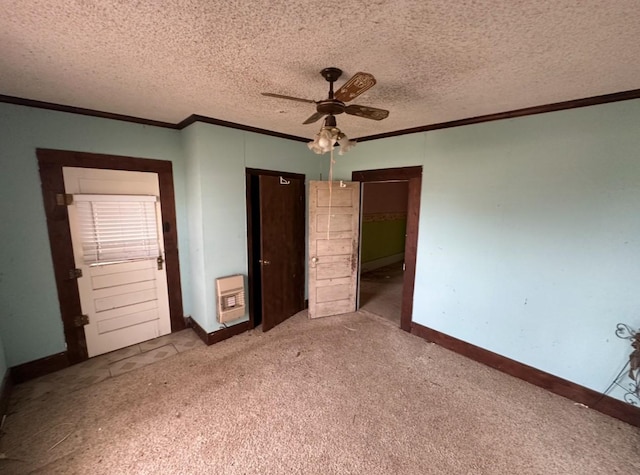 unfurnished bedroom with heating unit, a textured ceiling, light carpet, and crown molding