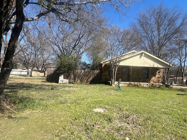 view of yard featuring fence