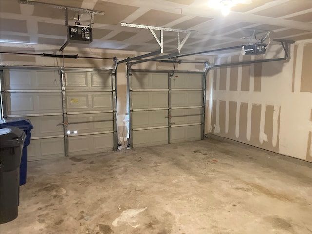 garage featuring a garage door opener