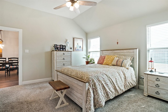 bedroom with baseboards, a ceiling fan, carpet flooring, and vaulted ceiling