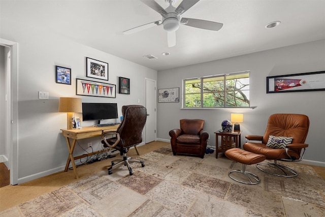 home office featuring visible vents, baseboards, carpet floors, and ceiling fan