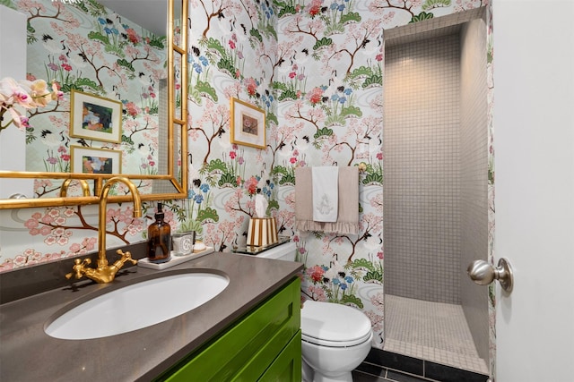 bathroom featuring wallpapered walls, walk in shower, toilet, tile patterned floors, and vanity