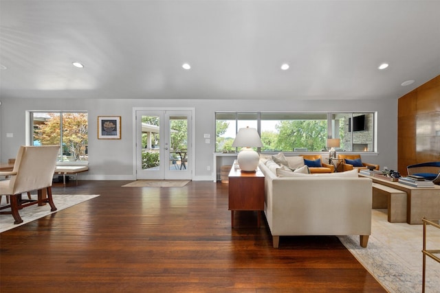 living room with recessed lighting, french doors, baseboards, and wood finished floors