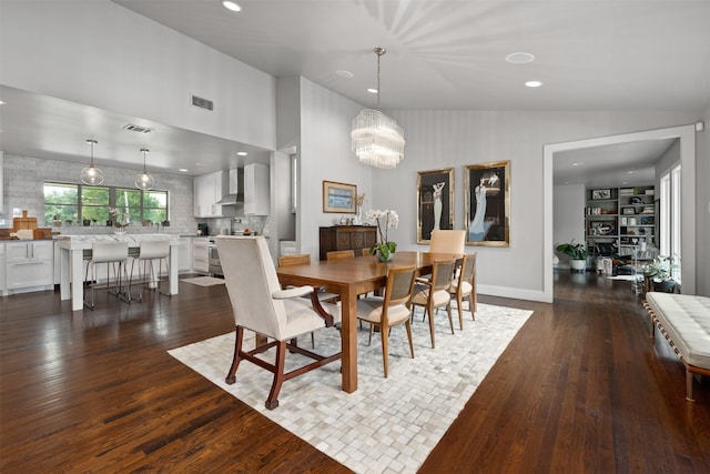 dining space featuring dark wood-type flooring, recessed lighting, and visible vents