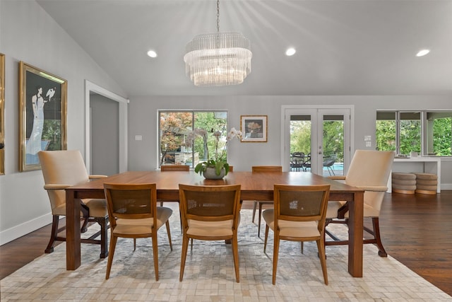 dining area with recessed lighting, french doors, wood finished floors, and vaulted ceiling