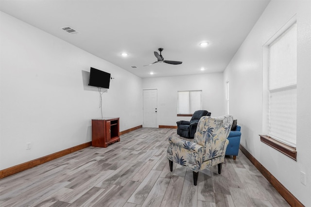 sitting room featuring light wood finished floors, visible vents, baseboards, recessed lighting, and a ceiling fan