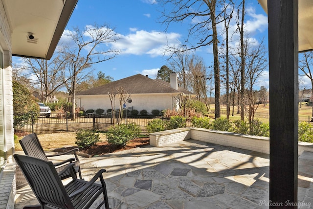 view of patio / terrace with fence