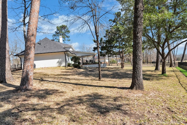 view of yard with fence