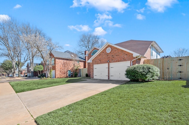 view of front of property with brick siding, fence, concrete driveway, a lawn, and a garage