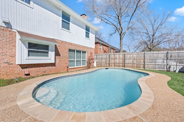 view of swimming pool featuring a fenced in pool and a fenced backyard