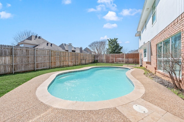 view of swimming pool featuring a fenced in pool and a fenced backyard