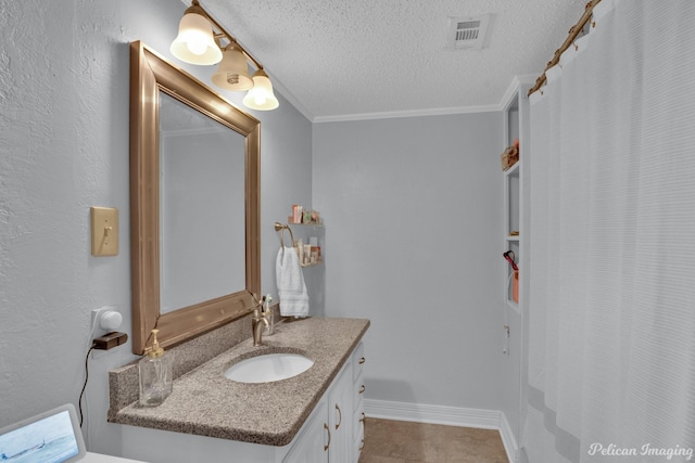 full bathroom featuring visible vents, a textured ceiling, crown molding, baseboards, and vanity