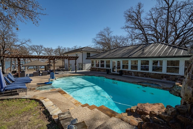 outdoor pool with a pergola, an outdoor structure, a storage structure, french doors, and a patio area