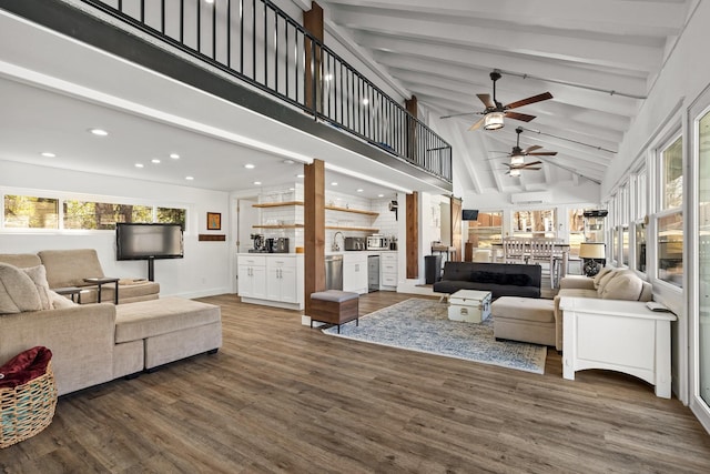 living room with beamed ceiling, high vaulted ceiling, wood finished floors, recessed lighting, and ceiling fan