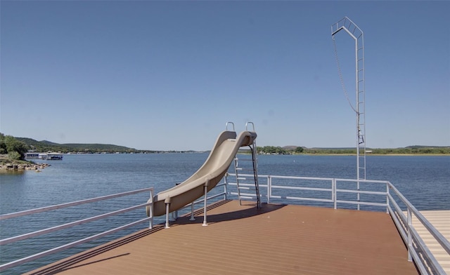 dock area with a water view