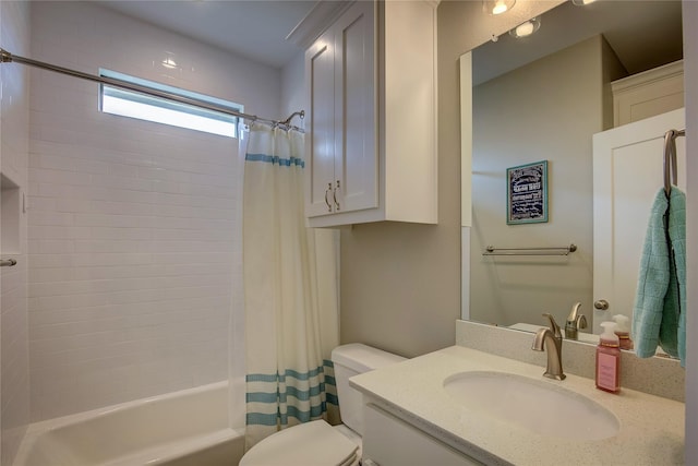 bathroom featuring vanity, toilet, and shower / bath combo