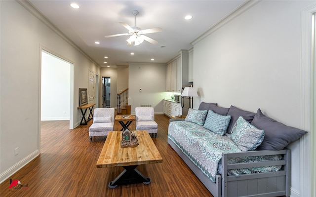 living area with dark wood-style flooring, stairway, and ornamental molding