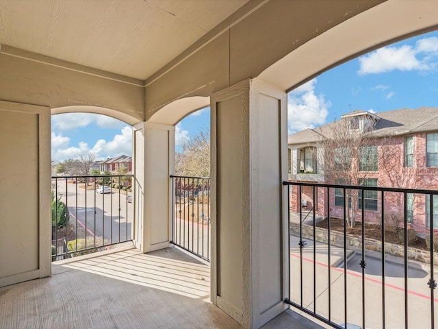 balcony featuring a residential view