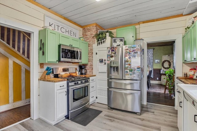 kitchen featuring stainless steel appliances, wood ceiling, green cabinets, and light countertops