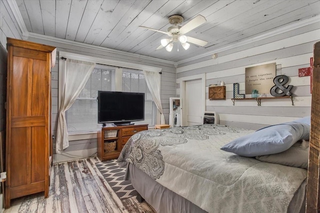 bedroom with crown molding, wood finished floors, wooden ceiling, and ceiling fan