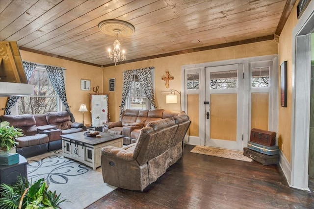 living room featuring wood ceiling, ornamental molding, dark wood-style flooring, and an inviting chandelier