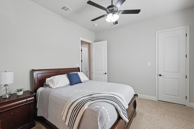 bedroom featuring visible vents, carpet floors, baseboards, and ceiling fan