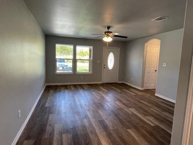 entryway featuring baseboards, visible vents, and dark wood-style flooring