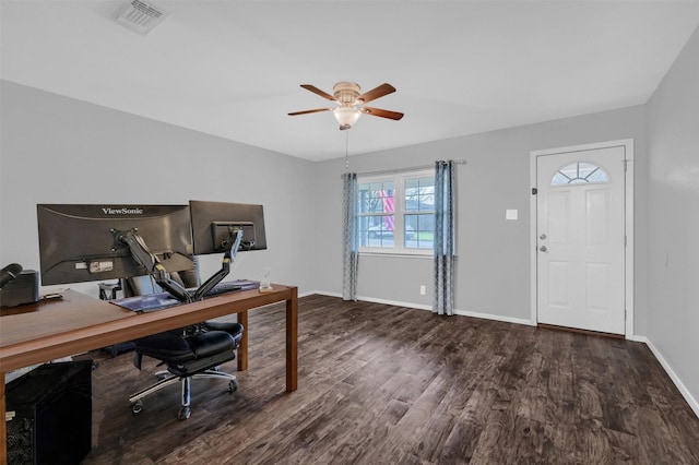 office area featuring baseboards, wood finished floors, visible vents, and ceiling fan