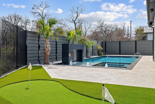 view of pool featuring a patio area, a fenced in pool, a jacuzzi, and fence