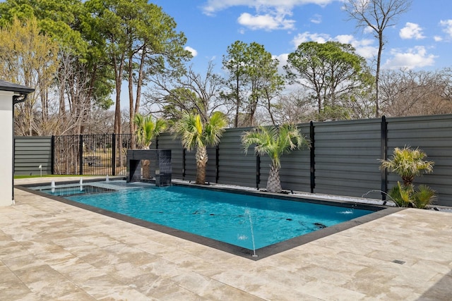 view of pool with a fenced in pool, a patio, and fence