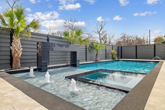 view of pool with an in ground hot tub, fence, and a fenced in pool