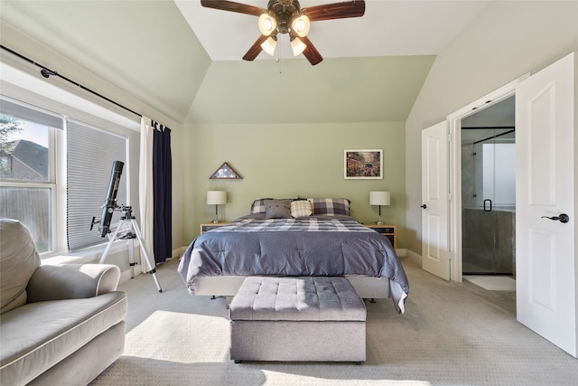 bedroom featuring lofted ceiling, a ceiling fan, baseboards, and light carpet