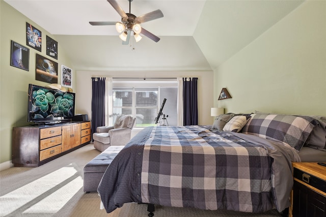 bedroom featuring baseboards, light carpet, a ceiling fan, and vaulted ceiling