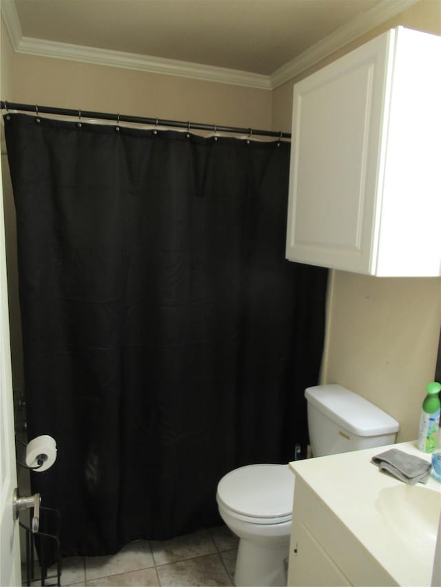 full bathroom featuring tile patterned flooring, toilet, vanity, and ornamental molding