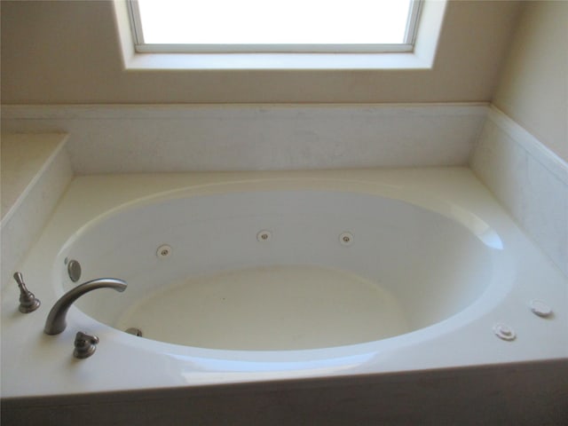 interior space with a whirlpool tub