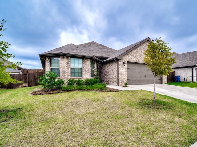 view of front of home featuring driveway, fence, a front yard, a garage, and brick siding