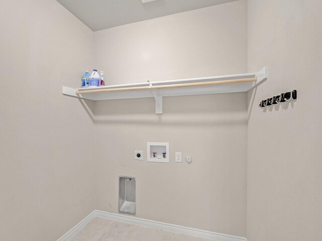 laundry room featuring baseboards, gas dryer hookup, laundry area, hookup for a washing machine, and electric dryer hookup