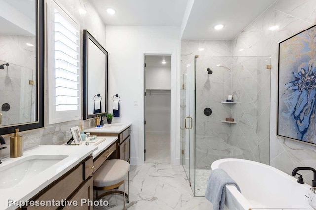 1409 Roundwash Way, Midlothian, TX 76065 - full bath with marble look tiles, a shower stall, a soaking tub, vanity, and recessed lighting