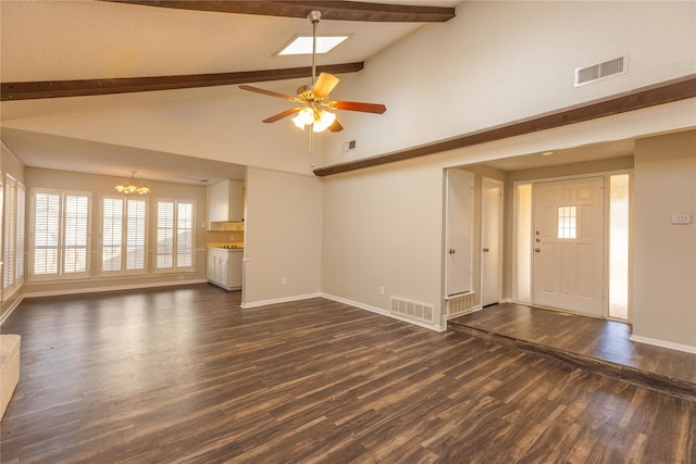 unfurnished living room with visible vents, beam ceiling, and dark wood-style flooring