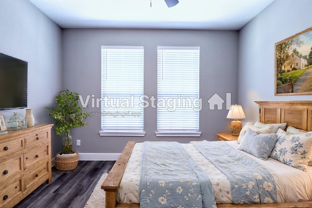 bedroom with dark wood finished floors, multiple windows, baseboards, and ceiling fan