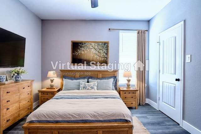 bedroom with ceiling fan, baseboards, and wood finished floors