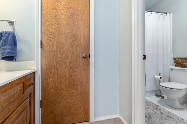 full bath with vanity and toilet