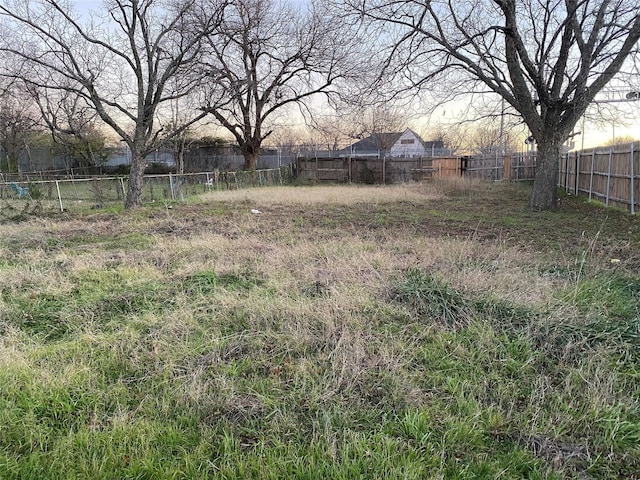 view of yard featuring fence